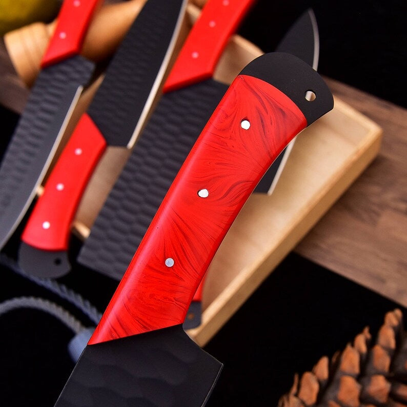 Set of stainless steel kitchen knives from Knives Gear Garage, featuring various blade sizes and ergonomic handles.