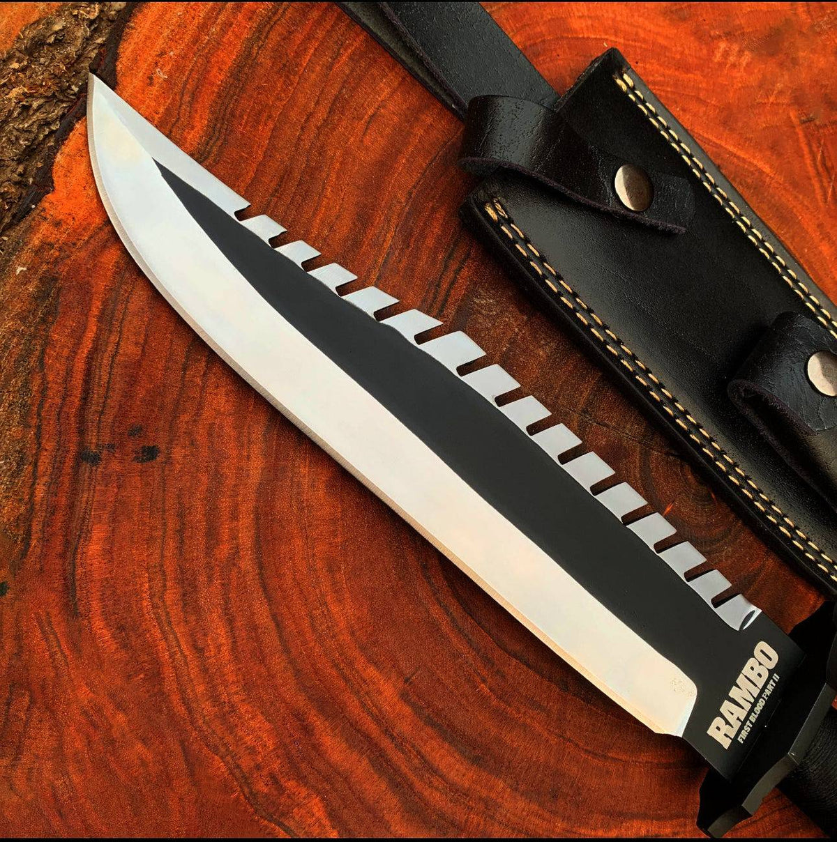 Custom handmade Rambo knife replica from First Blood Part 2 by cskforged, featuring a detailed blade and rugged handle.