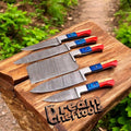 Knives Gear Garage kitchen knife set with Damascus steel blades, Texas flag handles, and a leather roll for storage.