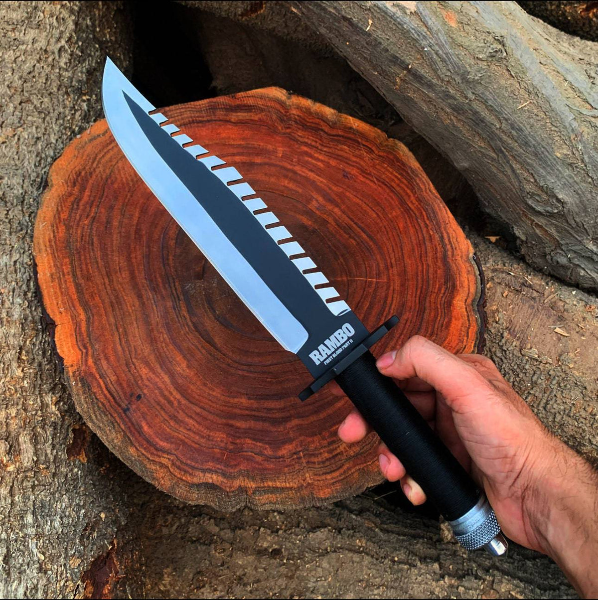 Custom handmade Rambo knife replica from First Blood Part 2 by cskforged, featuring a detailed blade and rugged handle.