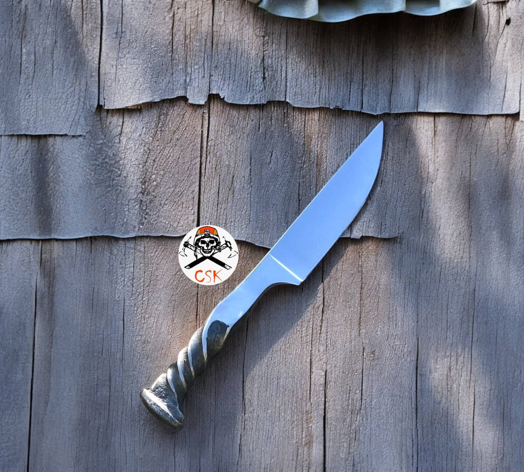 Forged railroad spike hunting knife by cskforged with twisted handle and rugged artisan blade, ideal for outdoor use.