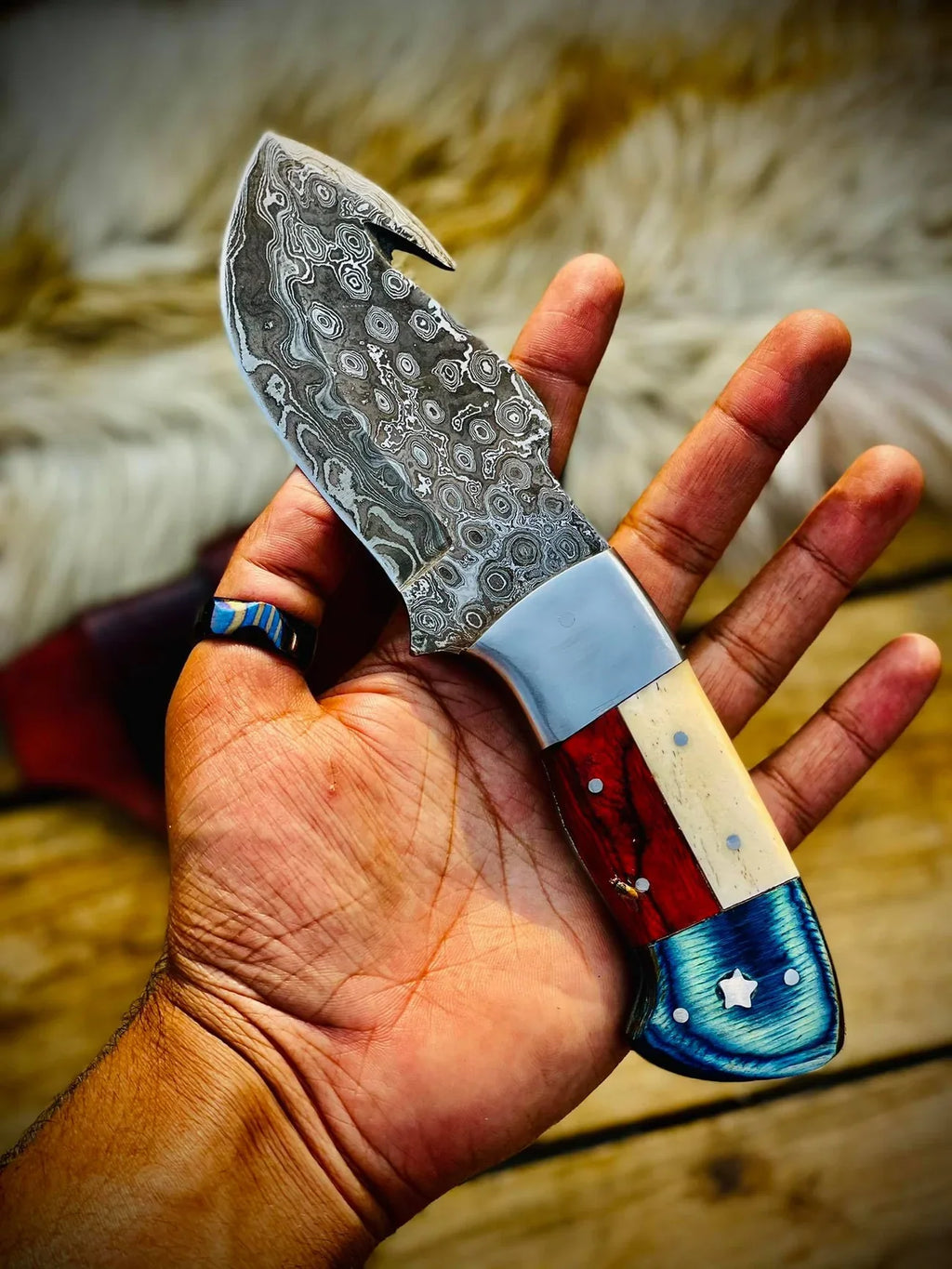 Handmade Texas flag handle gut hook skinning knife by Knives Gear Garage, featuring a durable blade and detailed flag design.