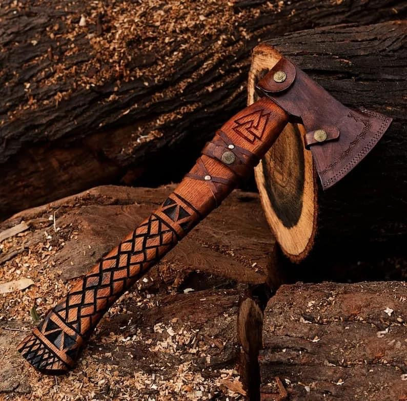 Handmade Viking axe hatchet with forged steel blade and wooden handle, crafted by Knives Gear Garage.