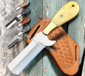 Handmade 7-inch camel bone handle cowboy bull cutter knife by cskforged with leather sheath, showcasing detailed craftsmanship and sturdy design.