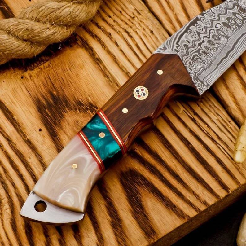 Hunting camping knife from Knives Gear Garage with a sharp blade and ergonomic handle, ideal for outdoor survival and camping tasks.