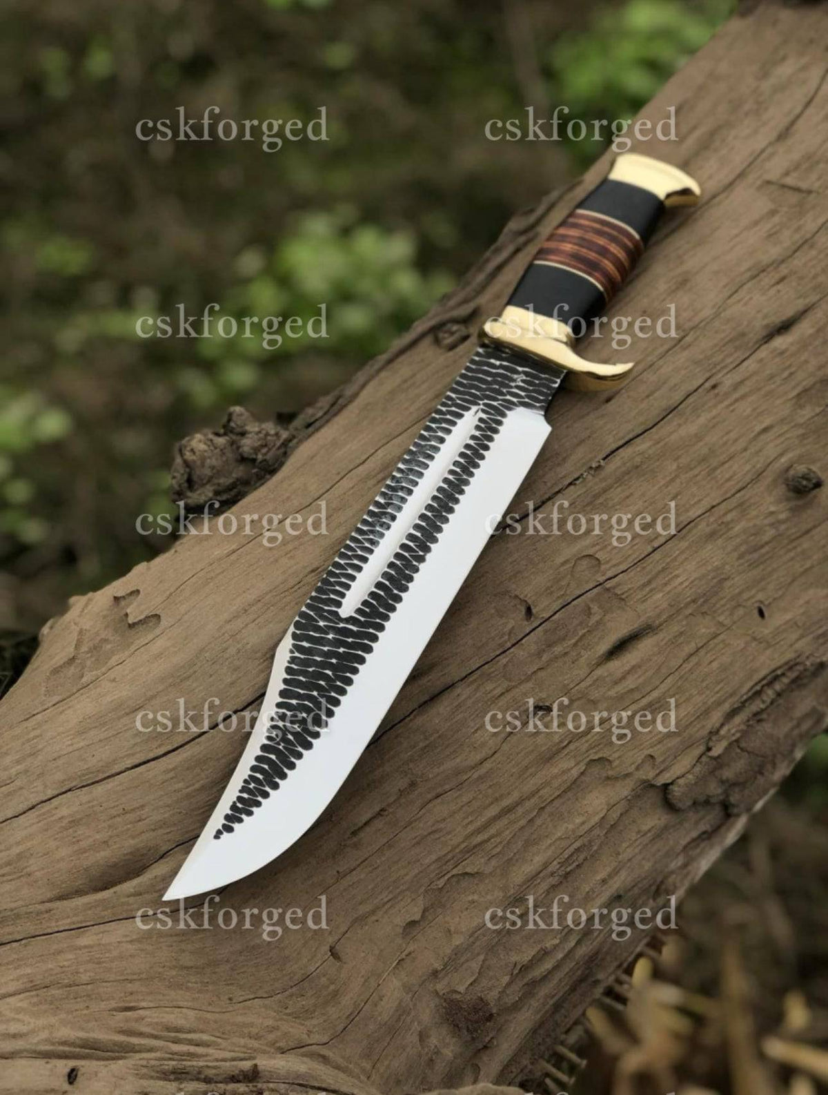 Custom handmade Crocodile Dundee Bowie knife by cskforged with a polished blade and detailed handle in a full view.