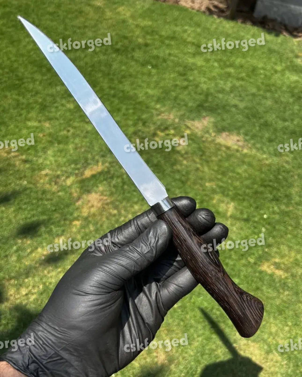 CSKForged 440C fillet kitchen knife with high mirror polish, showing the sharp blade and ergonomic handle in a close-up view.