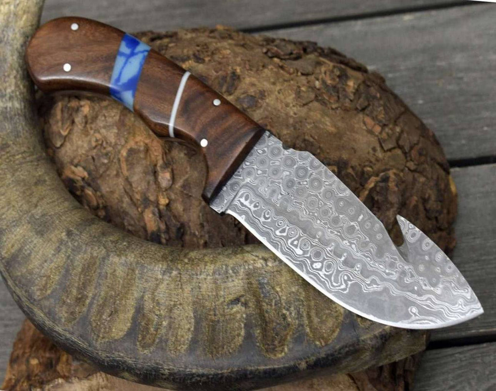 CSKforged personalized hunting knife with exotic rosewood and turquoise handle, showcasing detailed craftsmanship and natural materials.