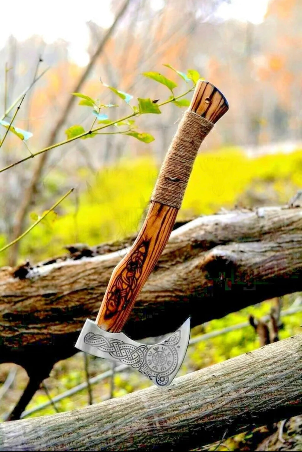 Custom Viking axe with wooden handle and metal blade, crafted by Knives Gear Garage, displayed with detailed craftsmanship.