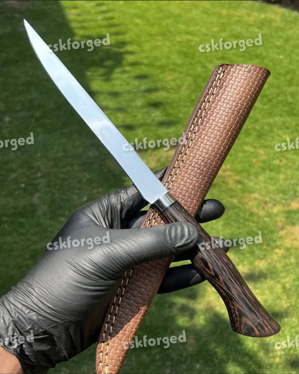 High mirror polished 440 C fisher fillet knife by cskforged, showcasing the sleek, full-tang design and sharp blade.