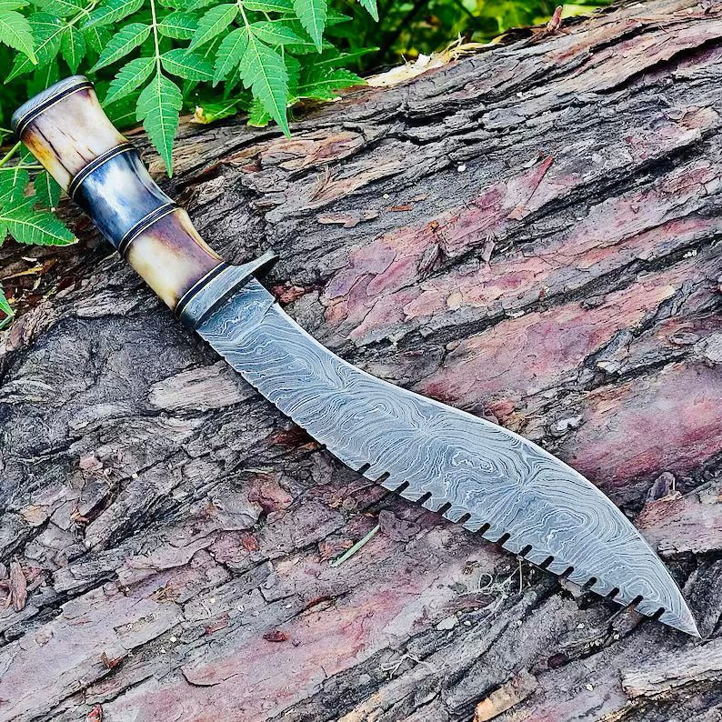Damascus Steel Kukri Knife by Knives Gear Garage with a curved blade and wooden handle, displayed on a white background.