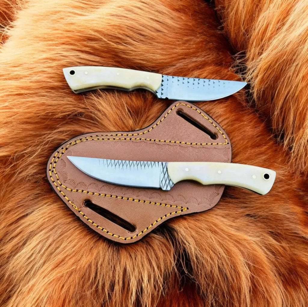 Pair of CSKForged camel bone fixed blade skinning knives with leather sheaths, ideal for EDC outdoor and hunting use