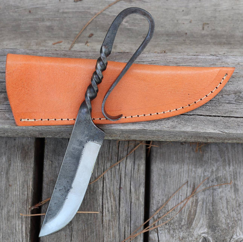 Pair of medieval-style hunting knives by cskforged with hand-forged iron blades and genuine leather sheaths, inspired by feasting utensils.