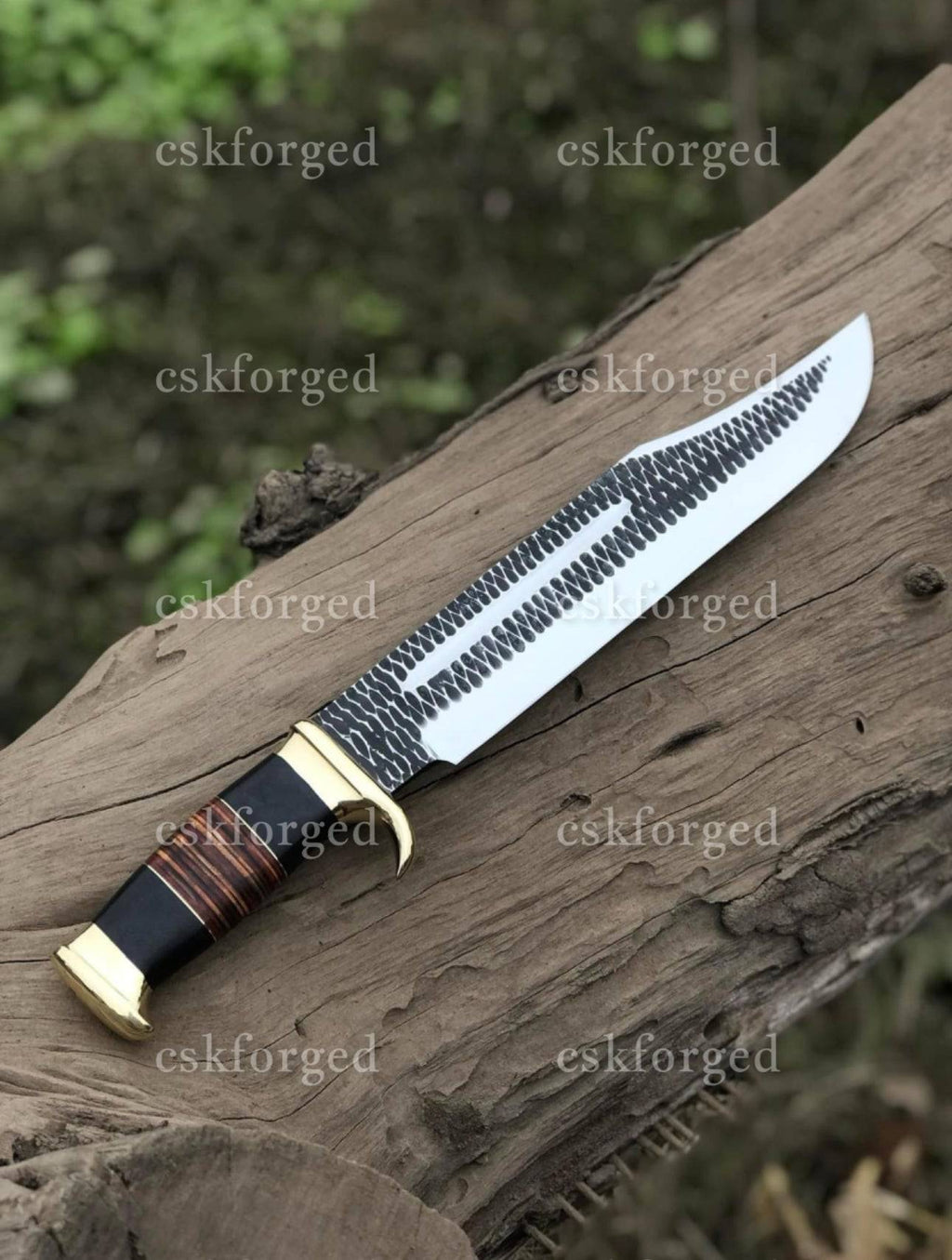 Handmade Crocodile Dundee Bowie knife by cskforged, featuring a detailed blade and rustic leather handle in a full view.
