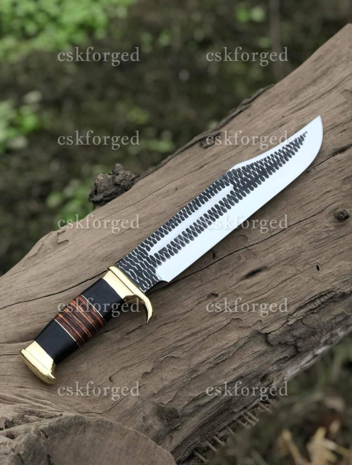 Handmade Crocodile Dundee Bowie knife by cskforged, featuring a detailed blade and rustic leather handle in a full view.
