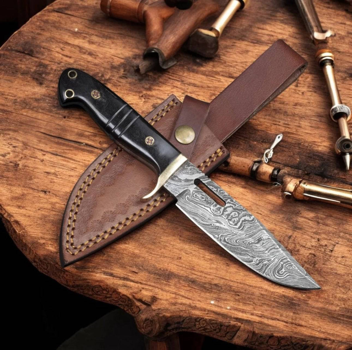 Hand forged Damascus steel drop point hunter knife from cskforged with a textured handle and sharp blade for outdoor hunting.