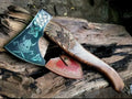 Handmade carbon steel hunting hatchet with wooden handle, Viking axe style, crafted by Knives Gear Garage, showcasing detailed craftsmanship