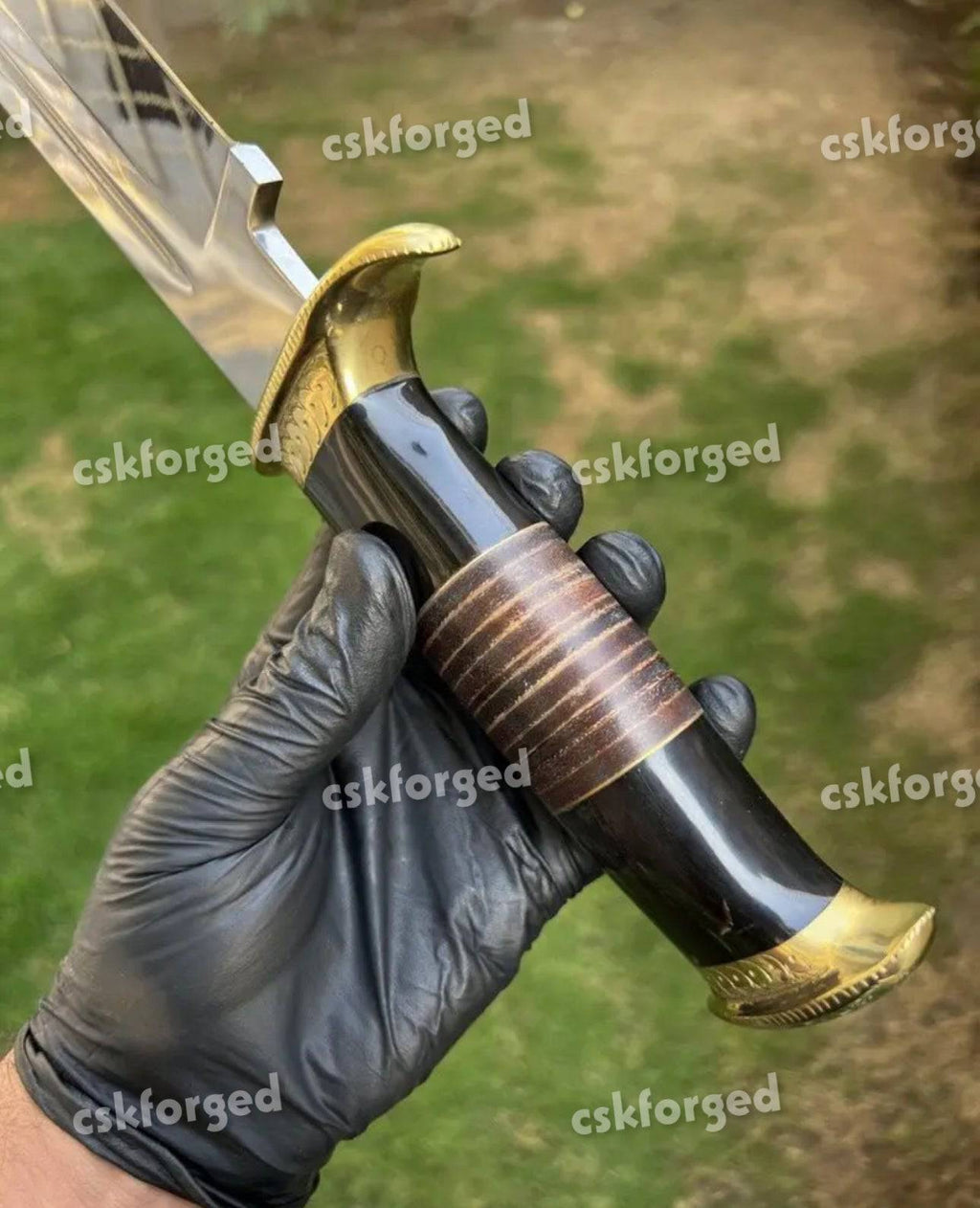 D2 Steel Dundee hunting knife with blood groove, featuring a full tang blade and textured handle by cskforged.