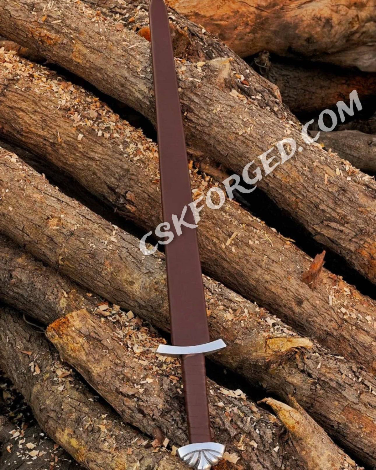 Medieval D2 tool steel Viking sword with custom Northmen design, leather-wrapped wooden scabbard, by cskforged.