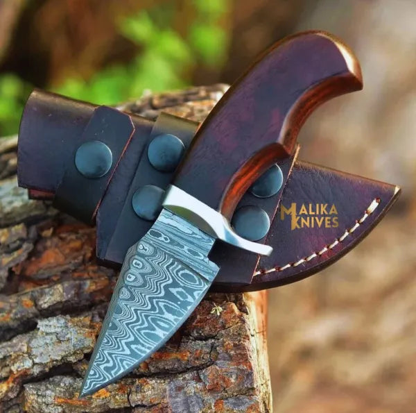 Mini Damascus hunting knife with rosewood handle by MALIKA KNIVES, featuring a sharp blade and polished wooden grip.