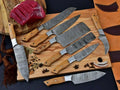 Handcrafted Damascus steel kitchen knife set with olive wood handles and leather case from Knives Gear Garage.