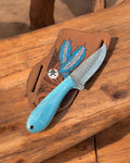 CSK Forged Saloon Savior Western EDC knife with rasp steel blade and epoxy resin inlay, shown in a close-up image.