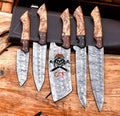 Handmade premium Damascus kitchen knife set with five knives and olivewood handles, crafted by cskforged.