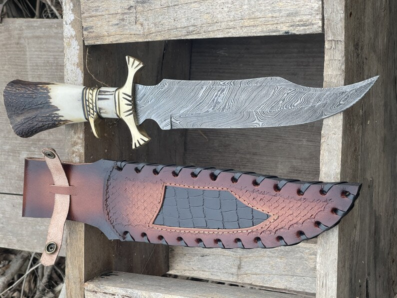 Handmade Bowie knife with a wooden handle and polished steel blade, crafted by Knives Gear Garage.