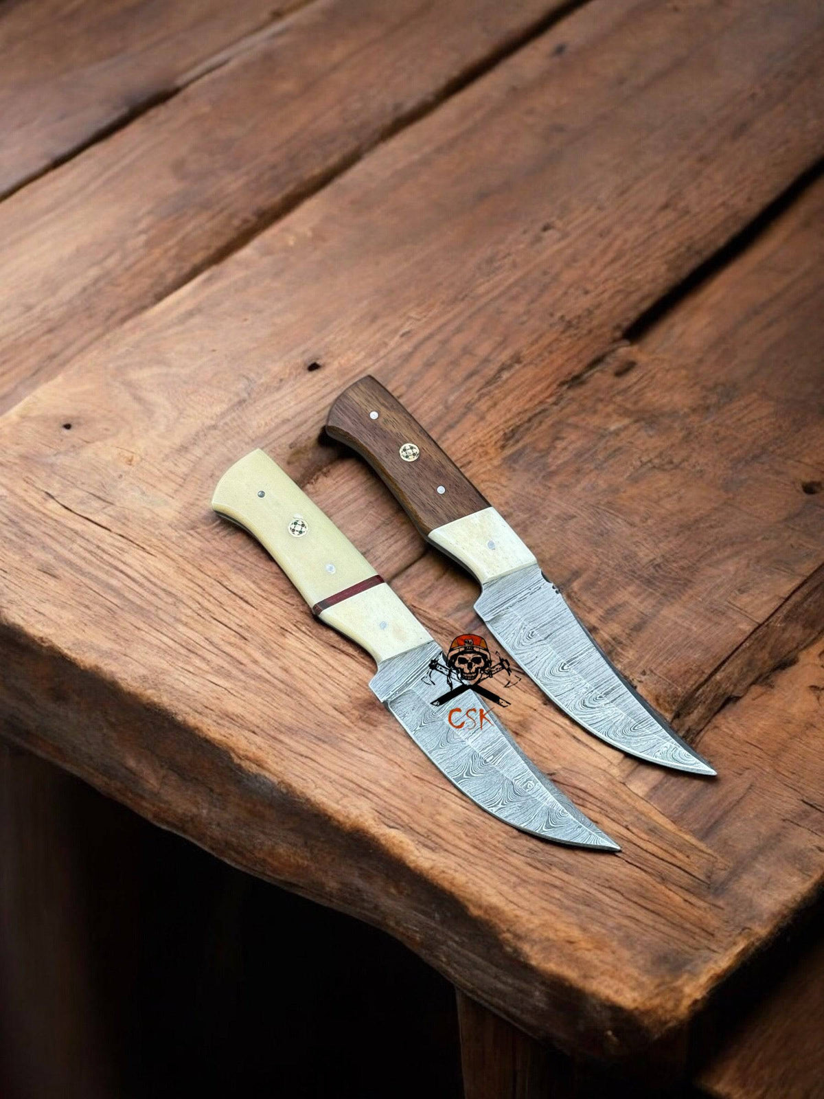 Hand-forged Damascus hunting knife set with 8-inch full tang blades, rosewood and bone handles by cskforged.