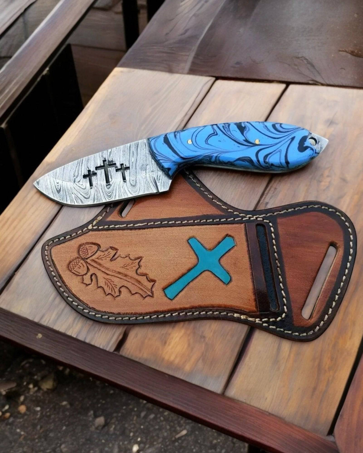 EDC cowboy knife by cskforged featuring Damascus steel blade with unique cross wirecut design, showcasing craftsmanship and intricate detailing.