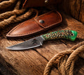 Forged D2 steel Frontier belt knife with pine cone handle, designed for hunting and survival by cskforged.
