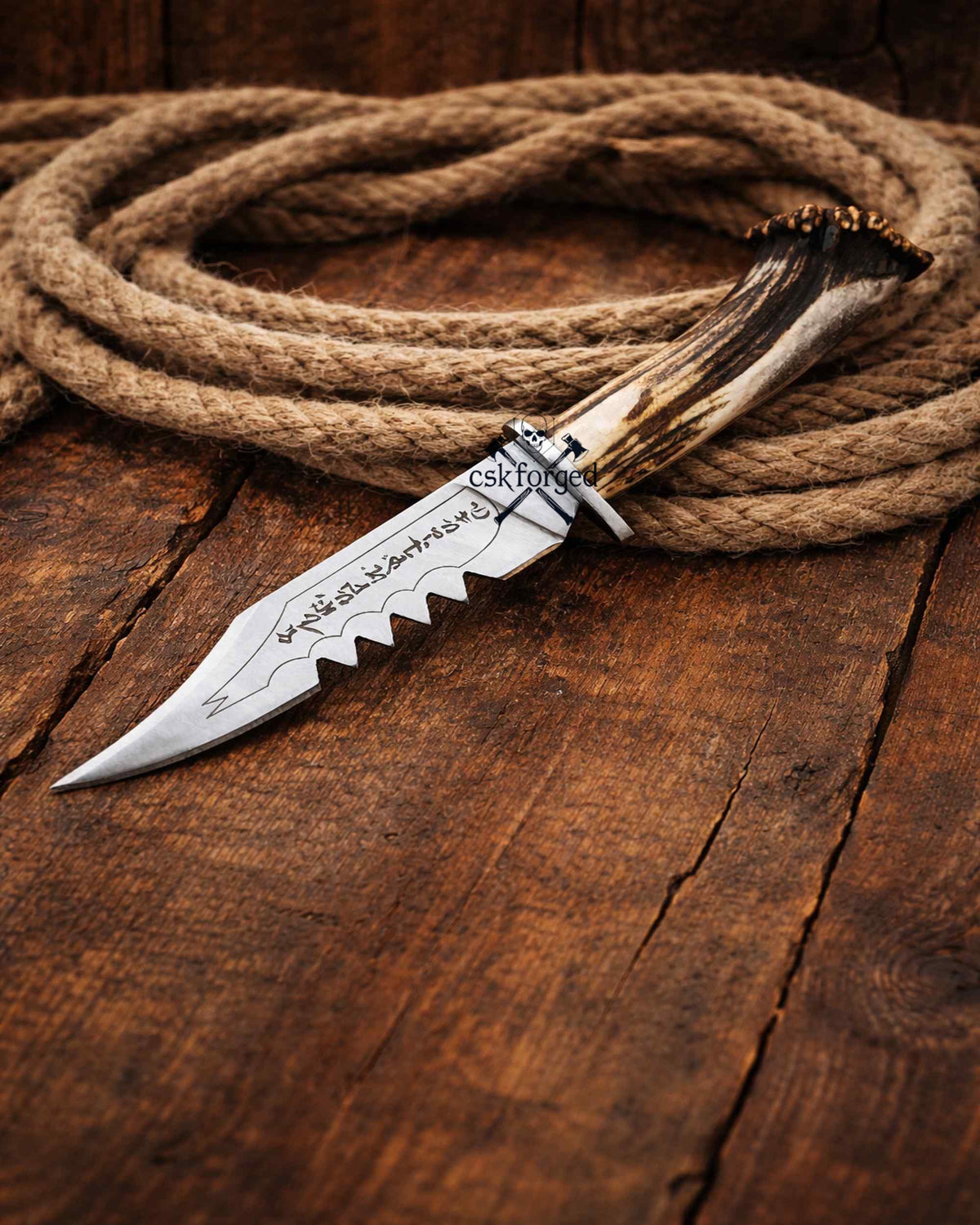 Frontier Demon Hunting Knife by cskforged with custom forged ruby blade and stag handle, ideal for survival and outdoor use.