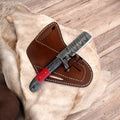 Damascus Bull Cutter EDC knife by cskforged with exotic wood handle and belt sheath, displayed with detailed blade and handle features.