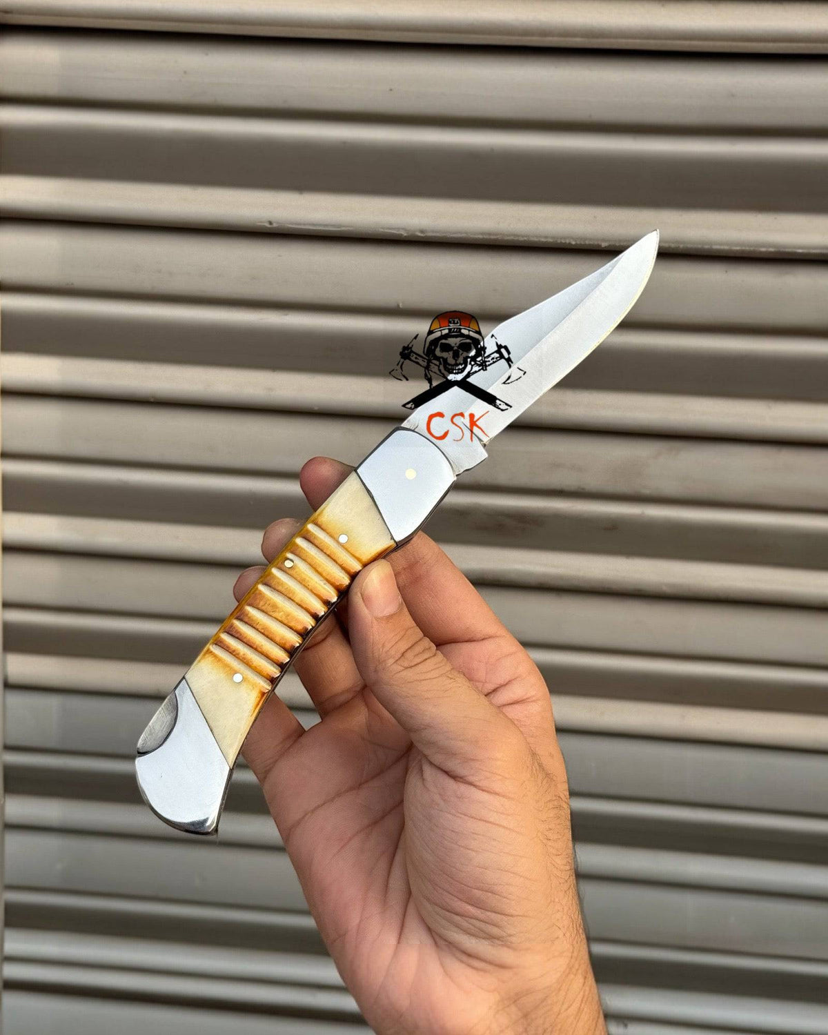 Damascus folding pocket knife by CSKforged with handcrafted lockback blade, suitable as a groomsmen gift, shown in image IMG-5715.