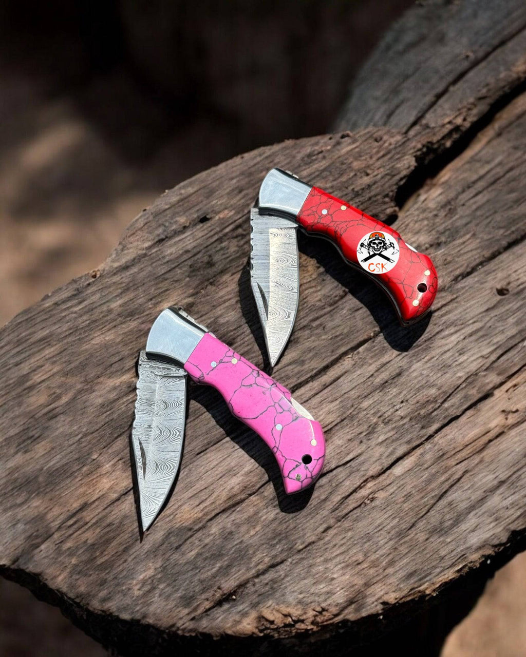Personalized Damascus steel pocket knife pair with Damascus blades, featuring custom engraving, from cskforged.