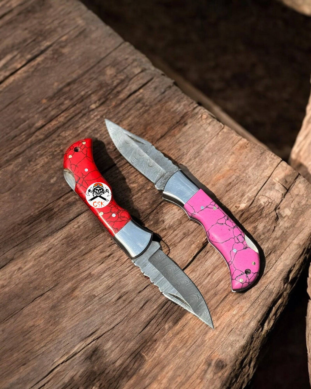 Personalized Damascus steel pocket knife pair with Damascus blades, featuring custom engravings, by CSK Forged.