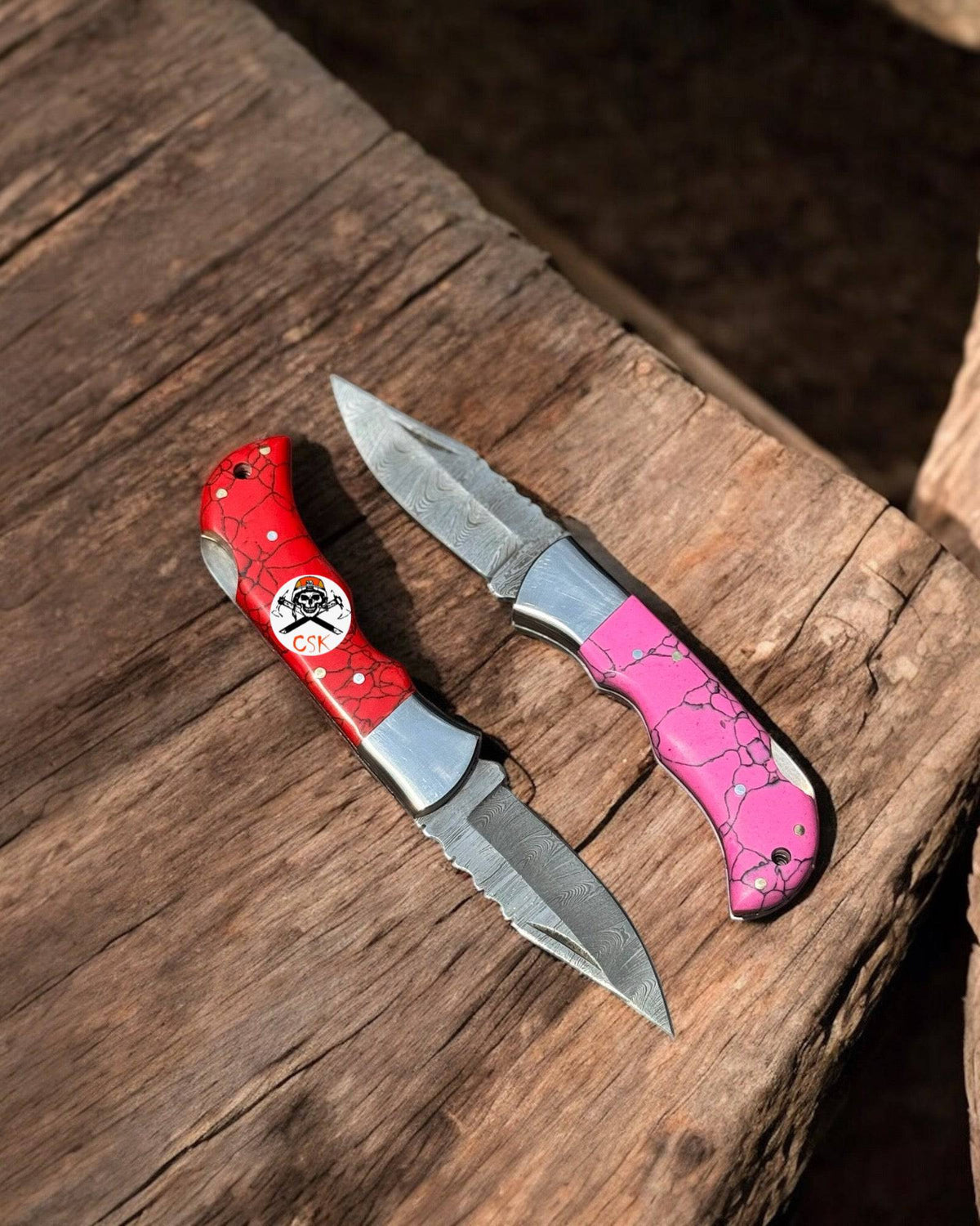 Personalized Damascus steel pocket knife pair with Damascus blades, featuring custom engravings, by CSK Forged.