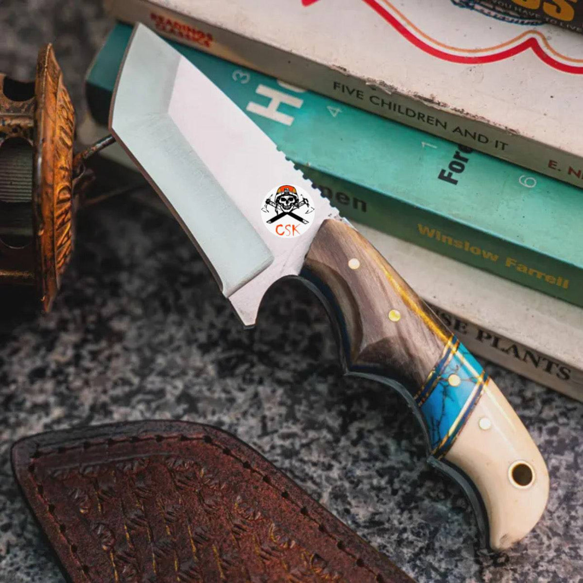 Turquoise finger-grooved Tantoo Blade hunting knife by CSK Forged with a sharp blade and textured handle for outdoor use.