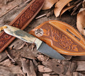 Western cowboy belt knife by cskforged featuring a Damascus blade, designed for hunting and outdoor use.