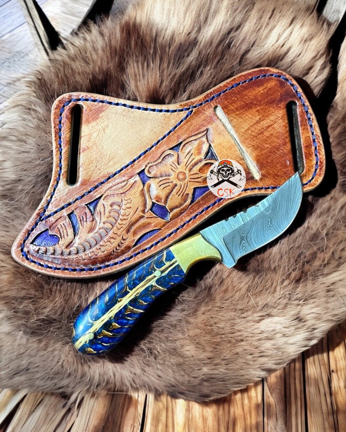 Cowboy knife with an 8-inch Damascus steel blade, blue epoxy pine cone resin handle, leather sheath, by cskforged.