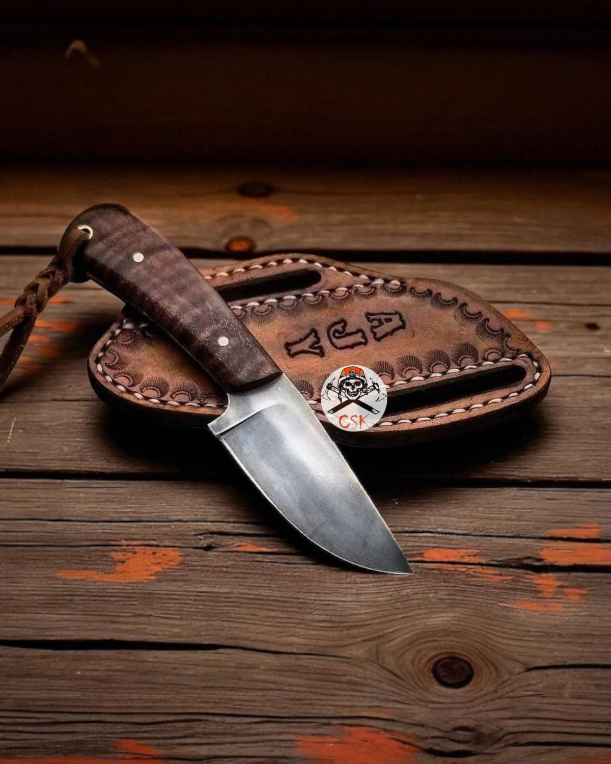 Cskforged wilderness bushcraft hunting knife with a durable burl rosewood handle and sharp steel blade.