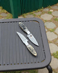CSKforged working Buckaroo cowboy knife set with Damascus blades, ideal EDC tools, displayed on a neutral background.
