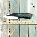 Handmade hunting knife with high carbon steel blade and pine cone handle, fixed blade design by cskforged.