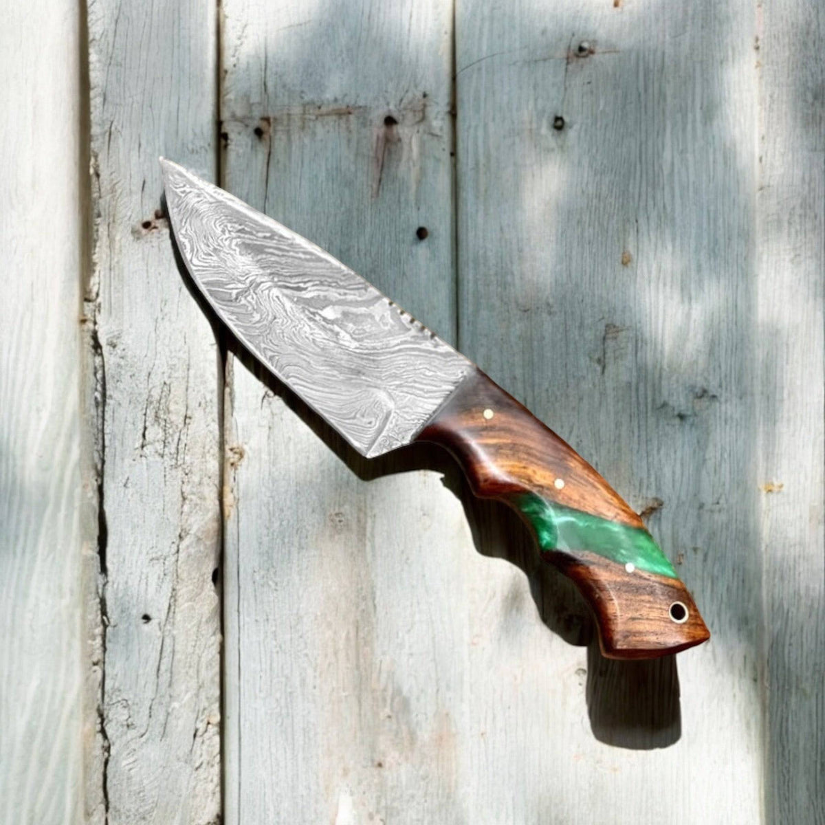 Handmade Damascus steel hunting knife with full tang epoxy rosewood handle by cskforged, featuring a fixed blade design.