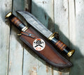 Crocodile Dundee Outback inspired Dundee knife with a premium Damascus blade, featuring a rugged handle and detailed craftsmanship.
