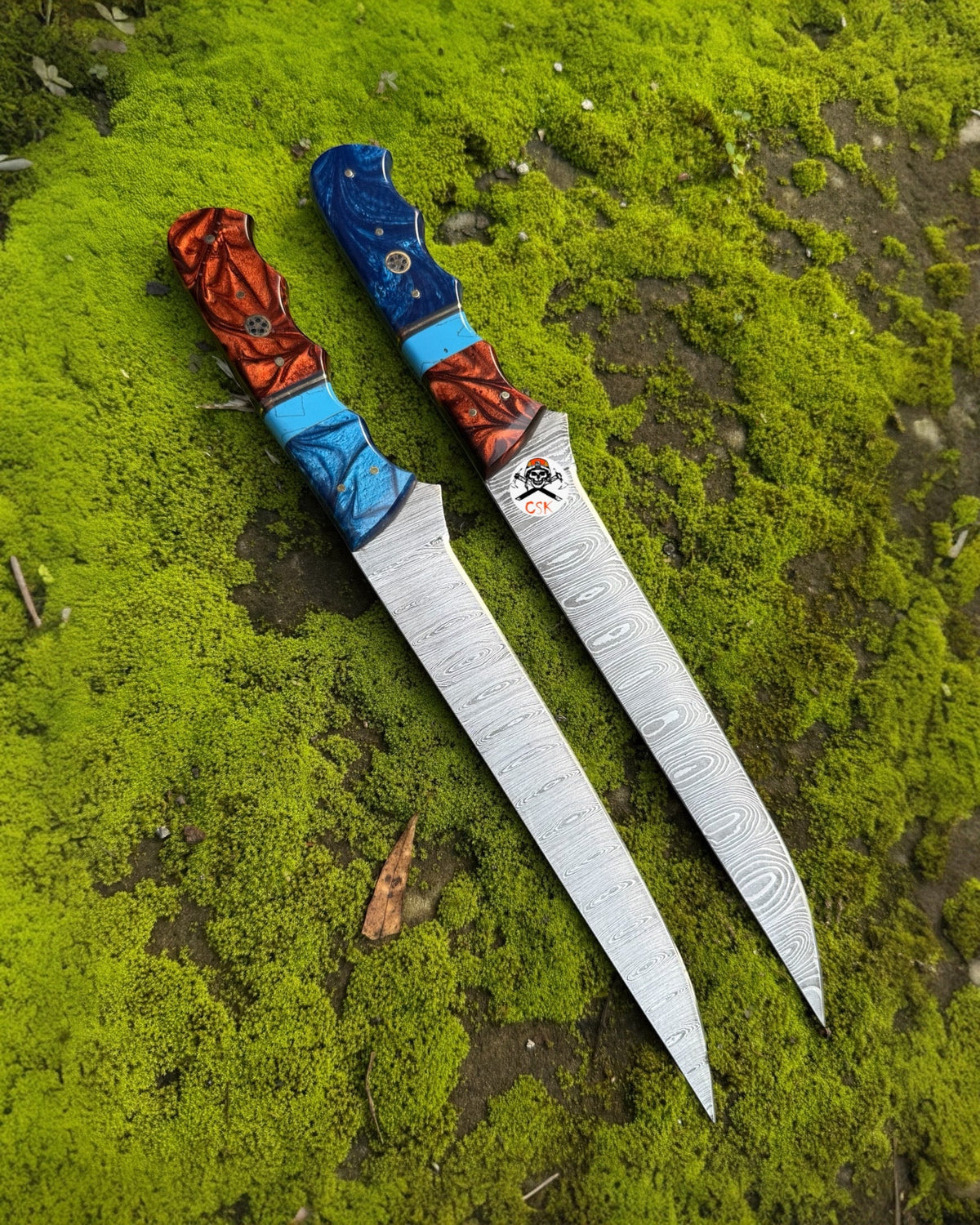 Hand-forged Damascus steel fillet knife set with custom resin handles and ultra-sharp blades from cskforged.