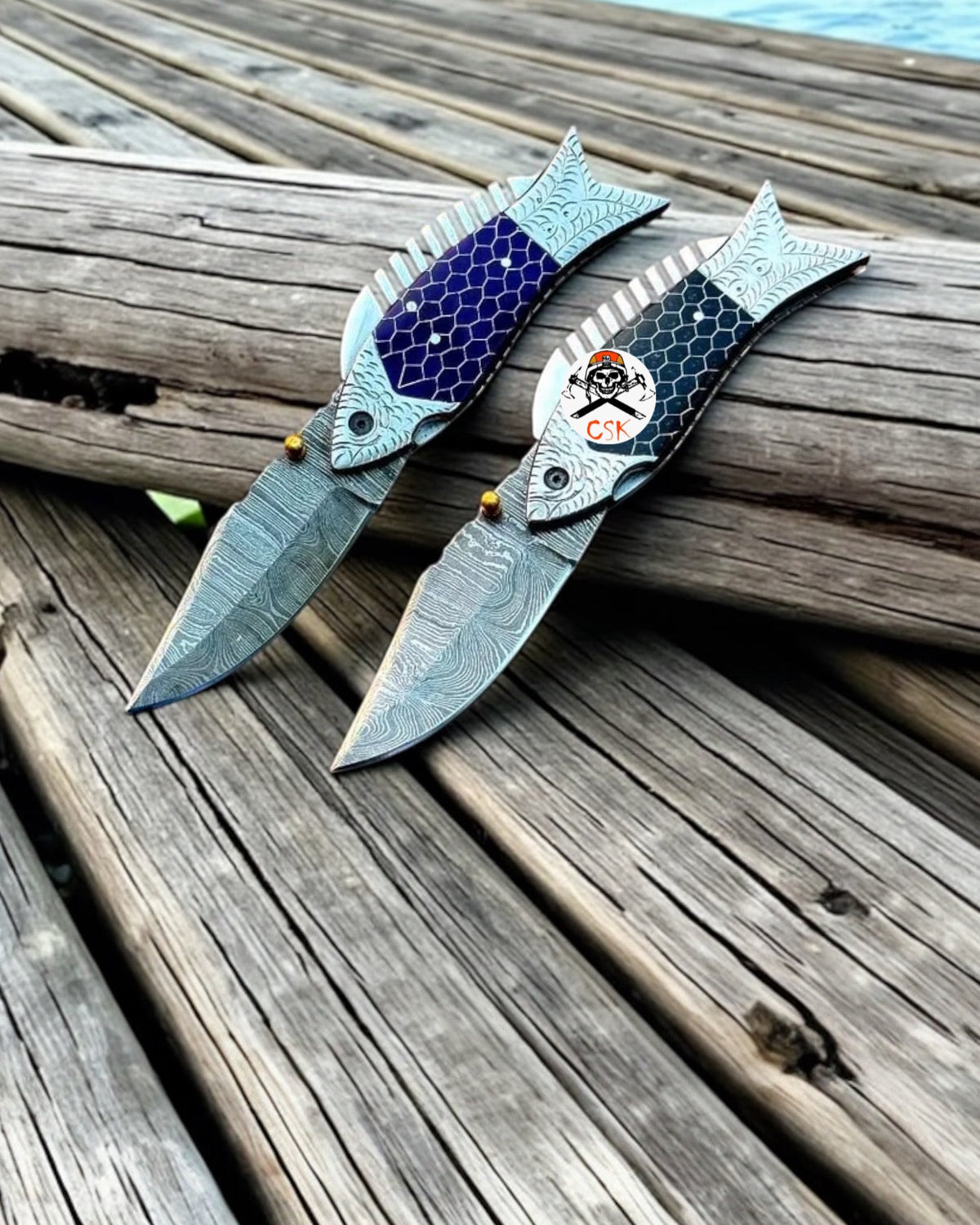 Damascus steel folding pocket knife with honeycomb handle by cskforged, 7-inch compact and durable fish-themed folding knife.