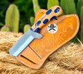 Custom handmade cowboy knife with rasp tool steel blade by cskforged, featuring a rugged handle and traditional design.