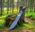 Full tang Damascus hunting and camping knife with resin and Damascus bolster handle, 17 inches, includes leather sheath.
