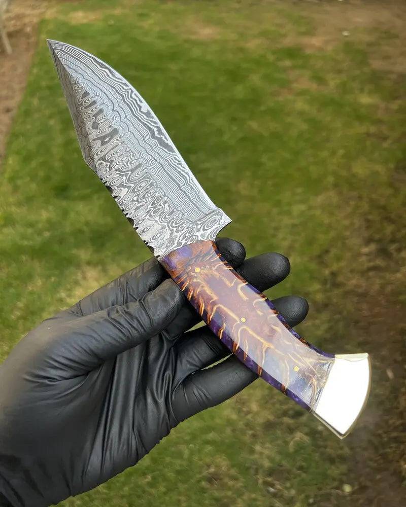 Premium Damascus hunting knife by cskforged with pine corn resin handle and leather sheath, showcasing its sharp blade and detailed craftsmanship.